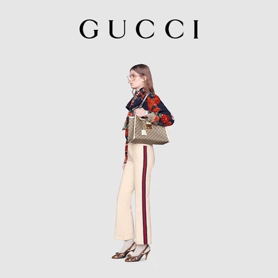 A lona suprema do meio da mala a tiracolo do cadeado do GG Gucci personalizou