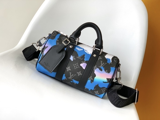 O eclipse do monograma do nascer do sol marcou a sala de Bag LV Keepall Bandoulière 25 do mensageiro com uma vista