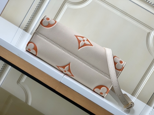 Monograma gigante OnTheGo milímetro Louis Vuitton Messenger Bag For Ipad Mini do açafrão de creme