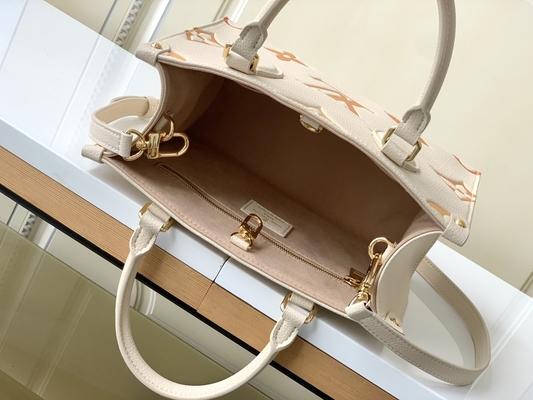 Monograma gigante OnTheGo milímetro Louis Vuitton Messenger Bag For Ipad Mini do açafrão de creme