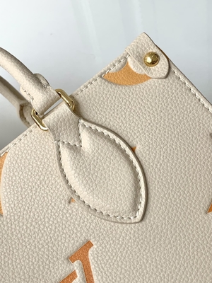Monograma gigante OnTheGo milímetro Louis Vuitton Messenger Bag For Ipad Mini do açafrão de creme