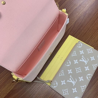 Mola branca do saco de Pochette Felicie LV no monograma Empreinte da cidade