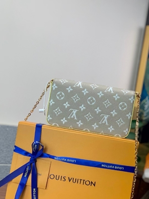 Mola branca do saco de Pochette Felicie LV no monograma Empreinte da cidade