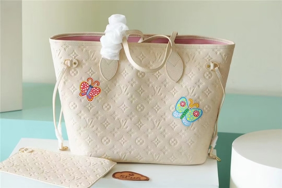O partido marcou senhoras monograma Empreinte de Neverfull milímetro da bolsa com marchetaria da flor