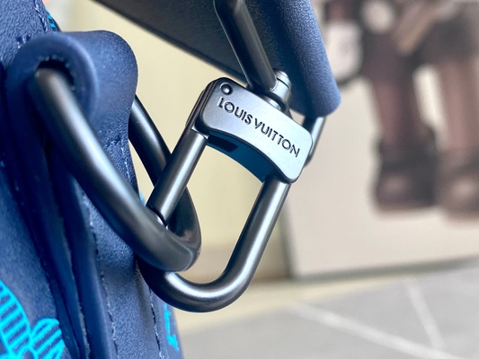 Os grandes homens marcados ensacam sacos azuis de Keepall BANDOULIÈRE 50 Boston