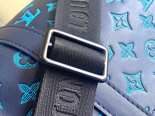 Os grandes homens marcados ensacam sacos azuis de Keepall BANDOULIÈRE 50 Boston